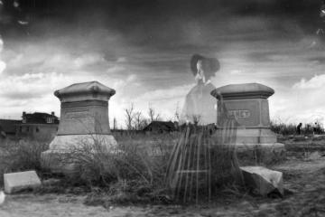 an old photo of a cemetery